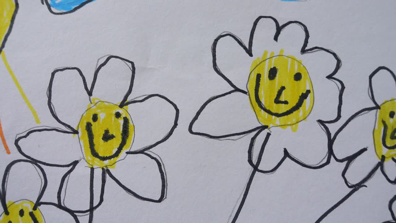 Barnetegning av kamilleblomster med solen i bakgrunnen