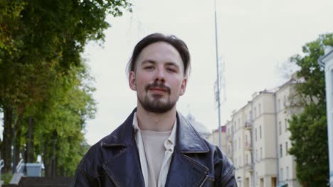 man portrait on city street