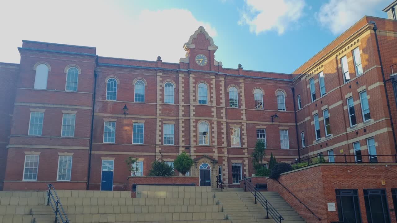 The former Nottingham General Hospital, now converted into The General apartments, features iconic red-brick architecture in the heart of Nottingham, England