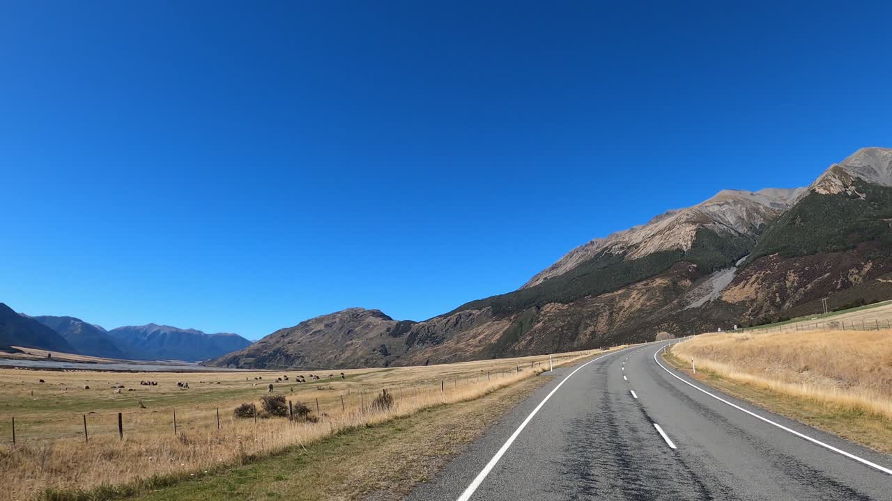 A road trip through Arthur's Pass next to the Waimakariri River, New Zealand.
