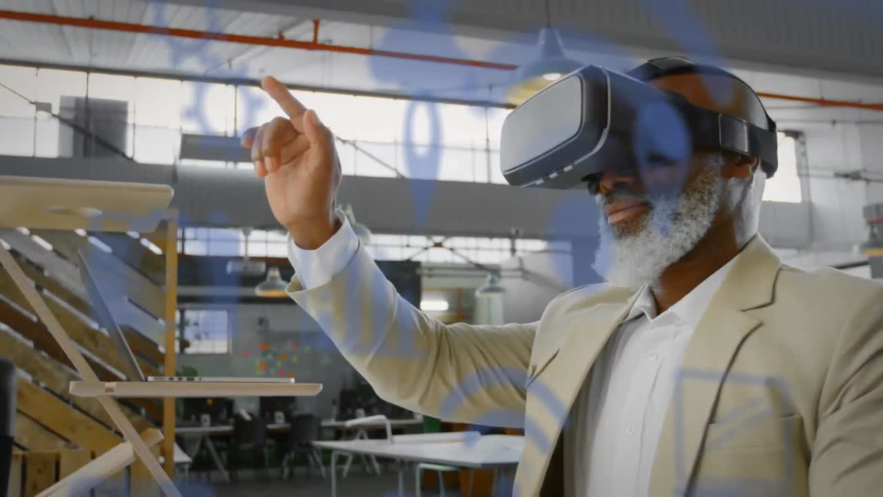 Blue digital icons floating against african american senior businessman wearing vr headset at office