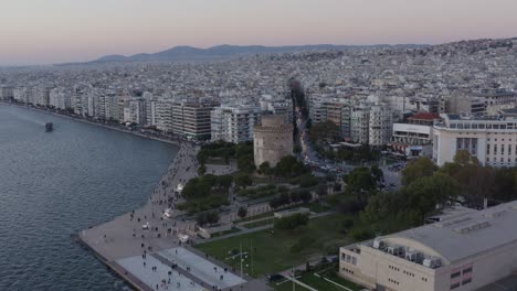 aerial - white tower of thessalonki at dawn