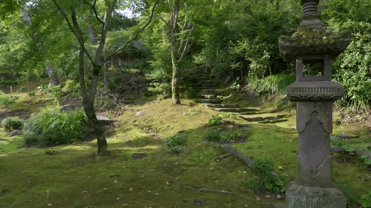 Beautiful landscape garden in Kyoto, Japan on lush summer day