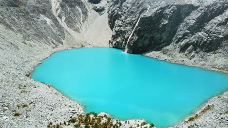 laguna 69 beautiful vivid blue lagoon in the andean mountains in huaraz peru tourism beyond machu picchu