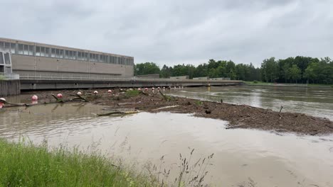 river donau near peak level full of flodsam during flood 2024 barrage bergheim near ingolstadt