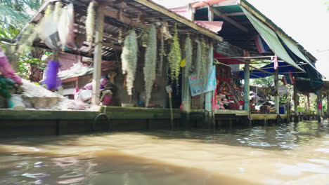 floating market scene in thailand