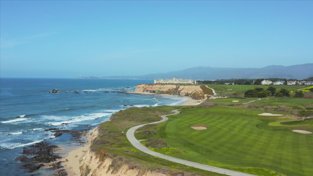 Aerial drone shot of the Ritz Carlton Hotel in Half Moon Bay, California, USA
