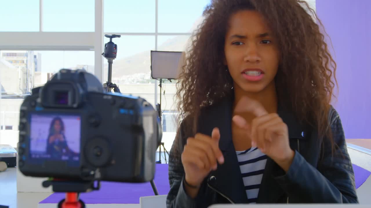 Model recording her video in photo studio 4k
