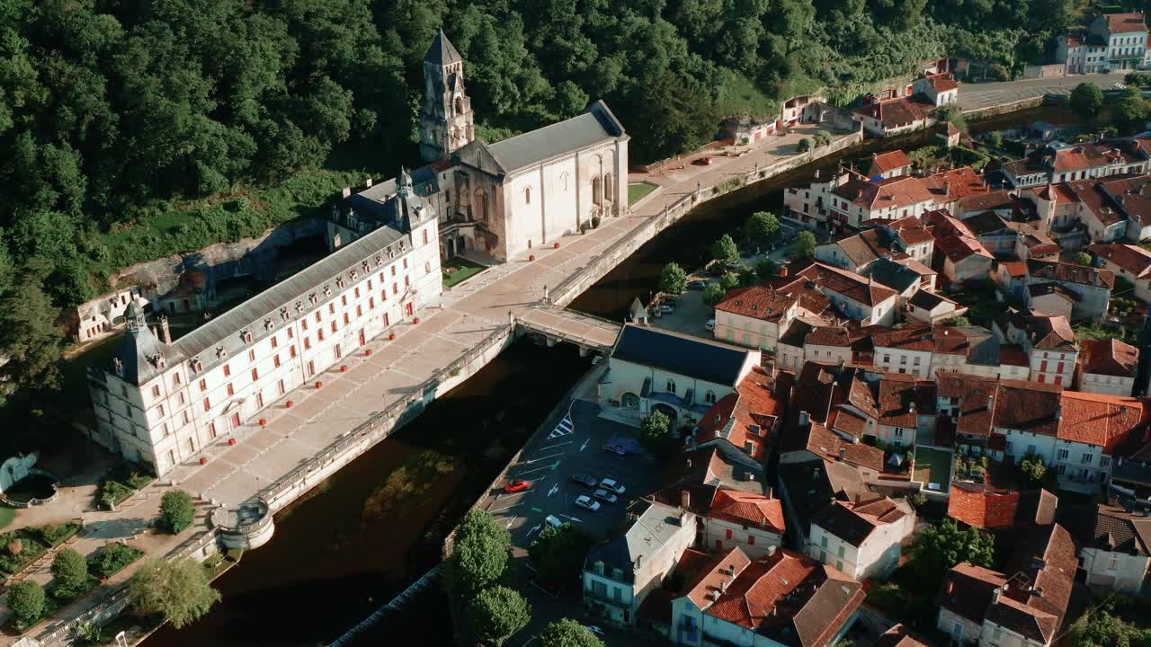 Brant&ocirc;me city and the town hall with river, aerial view in springtime, the south-western Venice