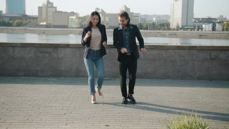 couple dancing on a city street