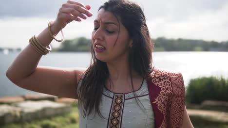 girl in traditional indian costume dancing - slow motion, medium