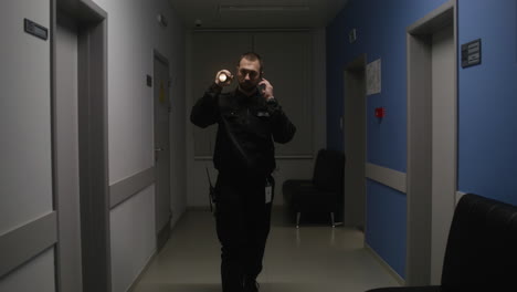 Man-in-uniform-working-on-the-corridor