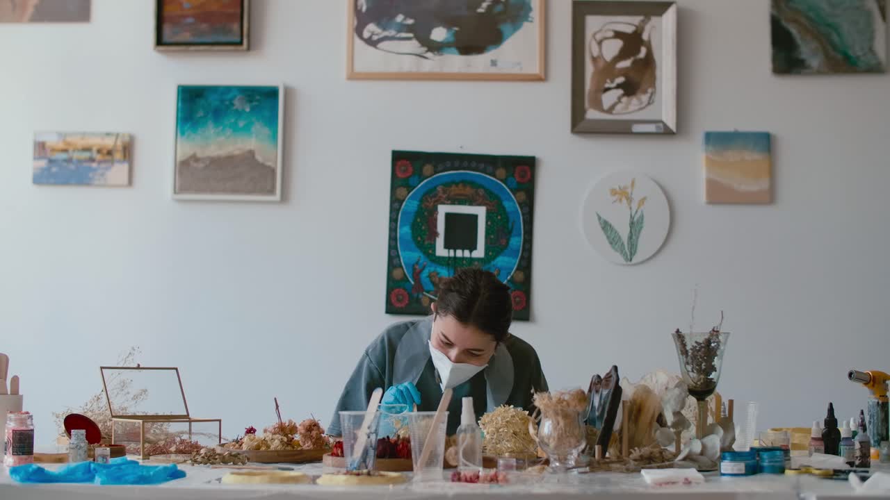 Artist Working in Resin Art Studio