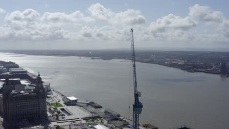 drone shot orbiting crane on sea front 02