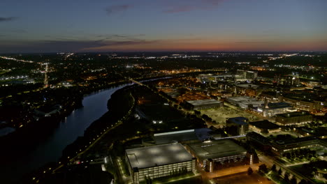 Indianapolis-Indiana-smooth-tilt-up-aerial-reveal-and-university-areas-of-the-city-at-night---6k-cinematic-footage---August-2020