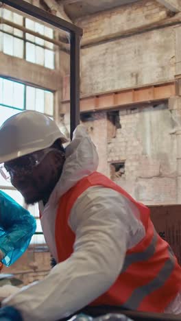 industrial workers in protective gear