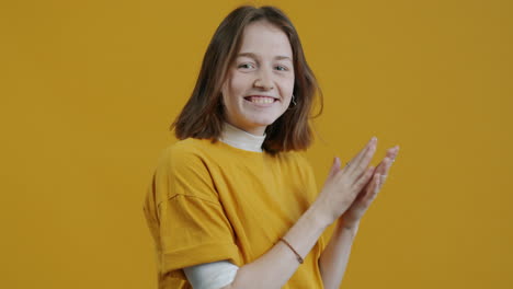 young woman clapping
