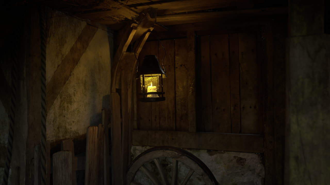 Warm glow of lantern illuminating rustic wooden interior in the evening