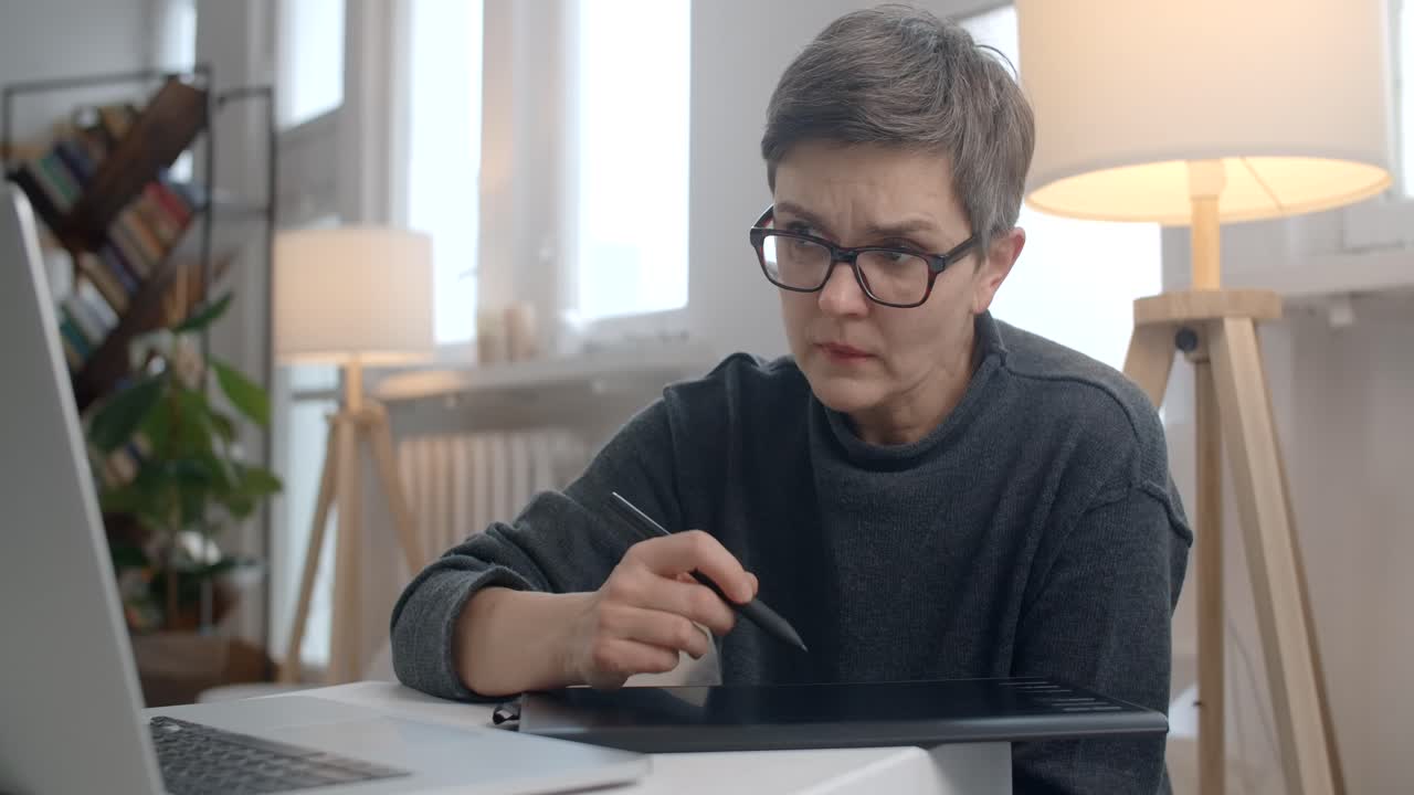 Woman Working on Digital Art at Home