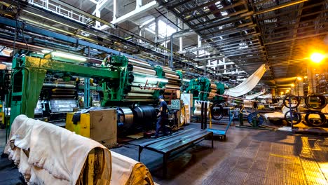 time lapse employee works with equipment at work shop