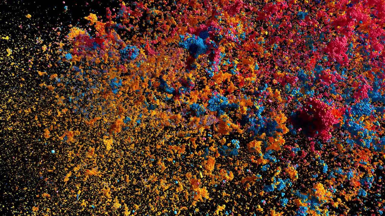 Colored powder explosion on black background with alpha mask