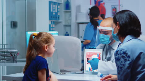 physician talking about heart functions