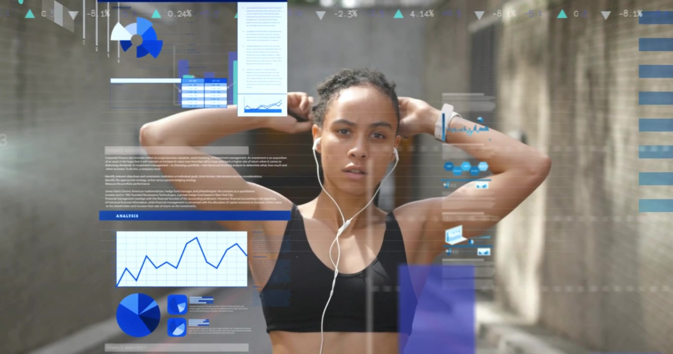 Female runner raising arms overhead and activating floating data charts for fitness performance