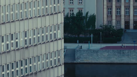 city building facade with people