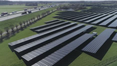 Very-high-aerial-drone-shot-of-solar-panels-on-a-field