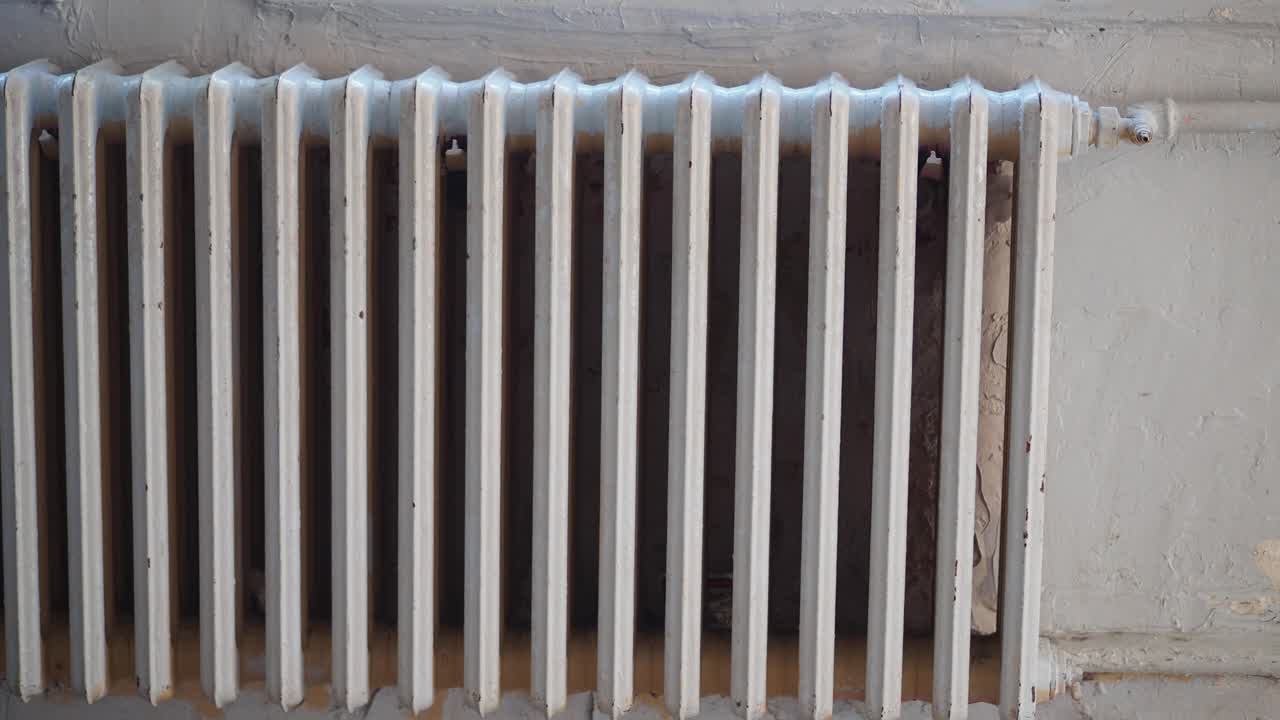 Close-up of a White Radiator on a Wall