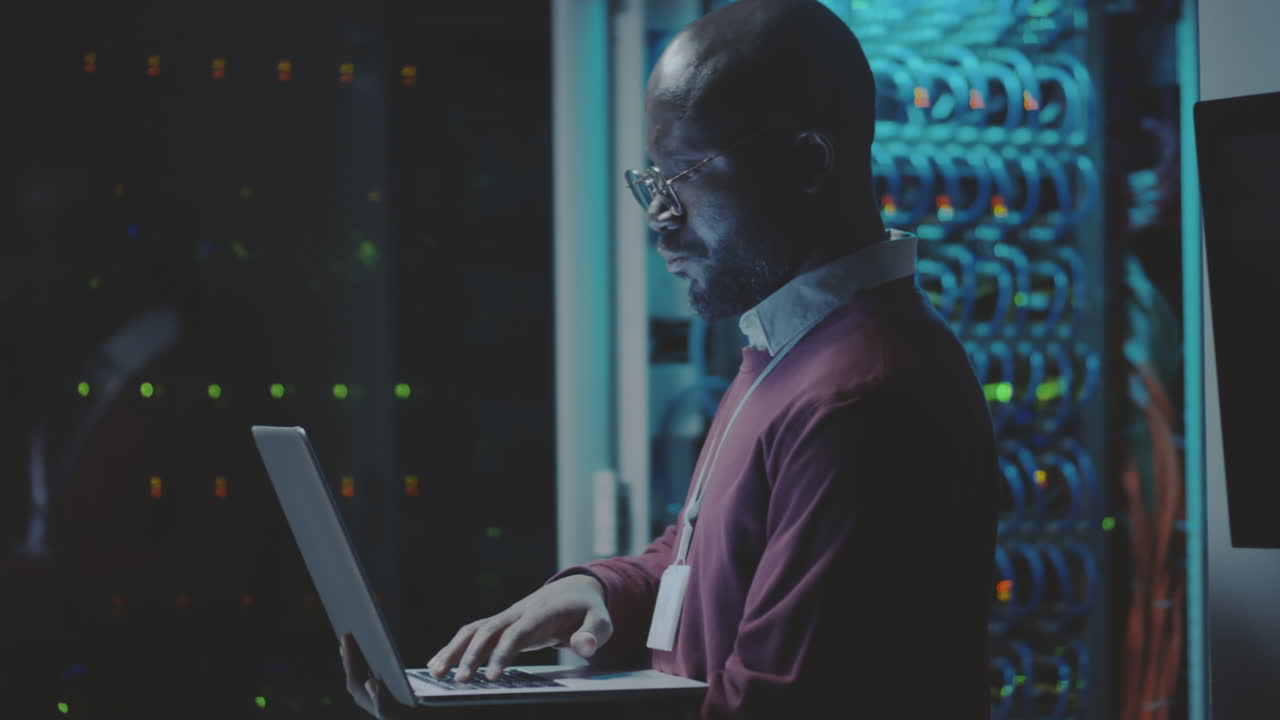 IT Professional Working in a Server Room