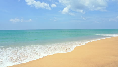 slow-motion of waves lapping a tropical shore