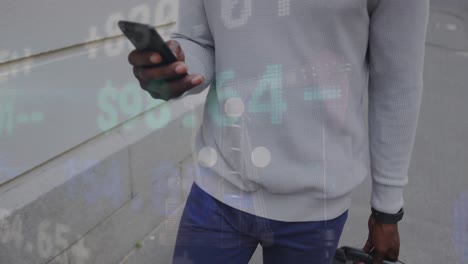 an african american man is out and about in the city, walking down the street and using his smartpho