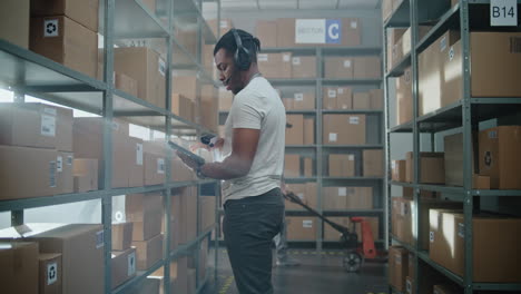 warehouse worker scanning packages