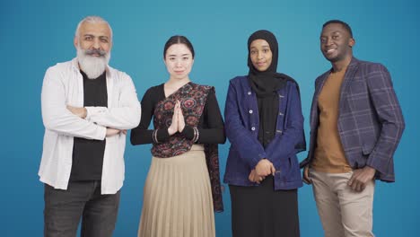 group of cheerful and friendly multiethnic friends spending time together and smiling at camera.