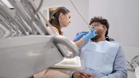 a patient undergoing dental care in a modern clinic setting, highlighting the utmost professionalism and expertise.