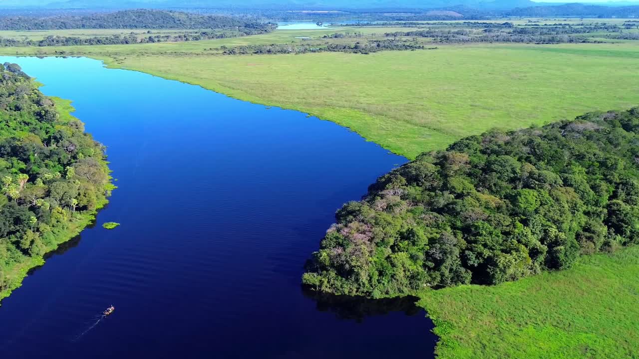Aerial view over the Paraguay River and the wetlands during rain season in the Pantanal