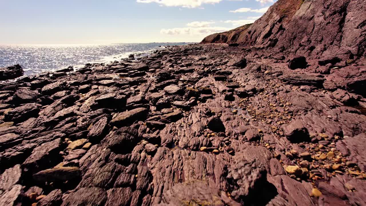 Aerial view of seascape along the vast beach on the South Coast during summer