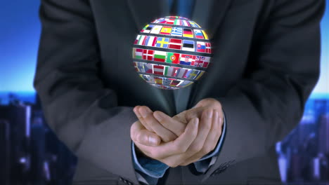 ball made of european nationals flags turning on businessman hands