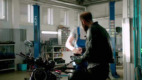 Man-waiting-for-his-motorcycle