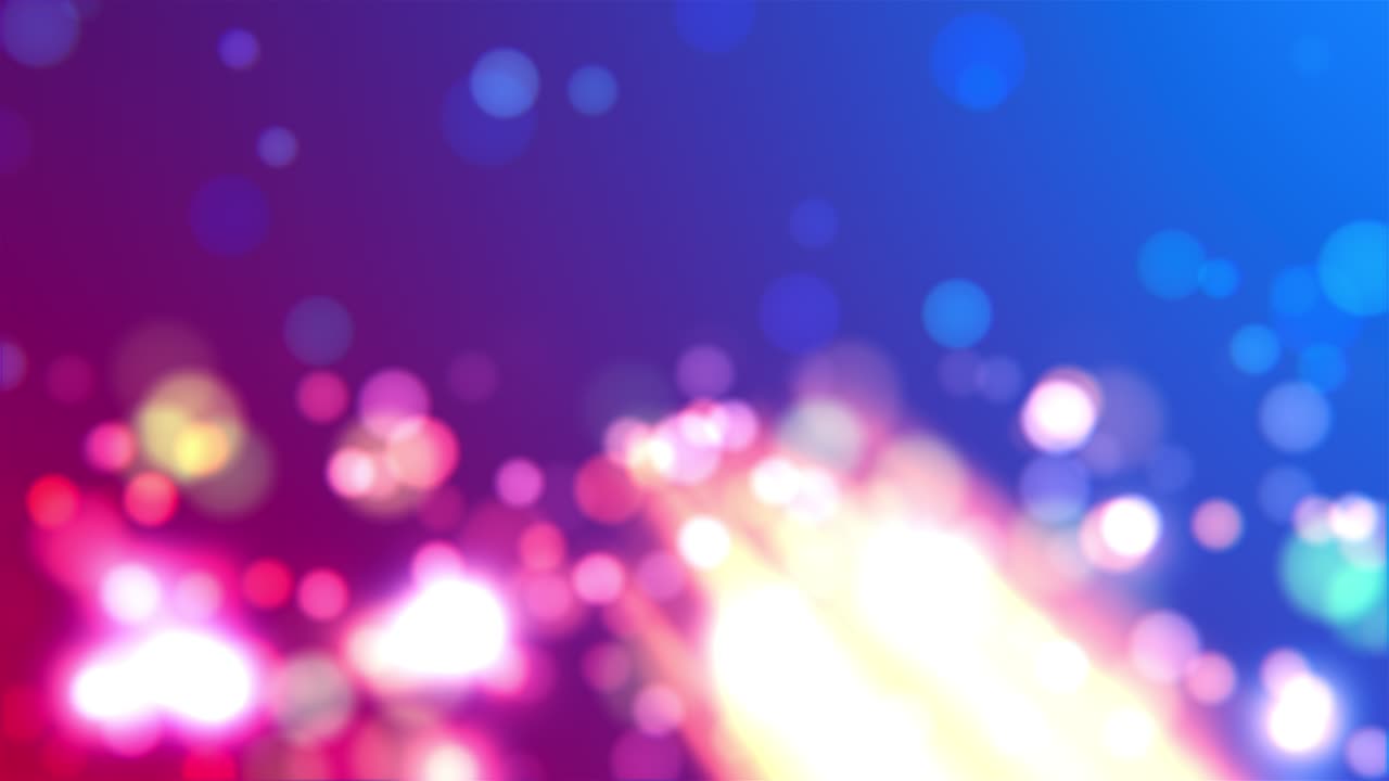 Partículas coloridas desfocadas com bokeh