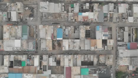 Aerial-Top-Down-View-Across-Rooftops-In-Downtown-Karachi