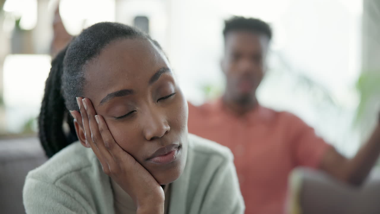 Divorce, stress and couple fight on a sofa angry