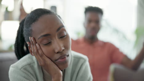 divorce, stress and couple fight on a sofa angry
