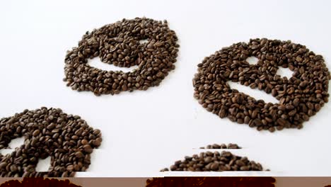 coffee beans forming various faces