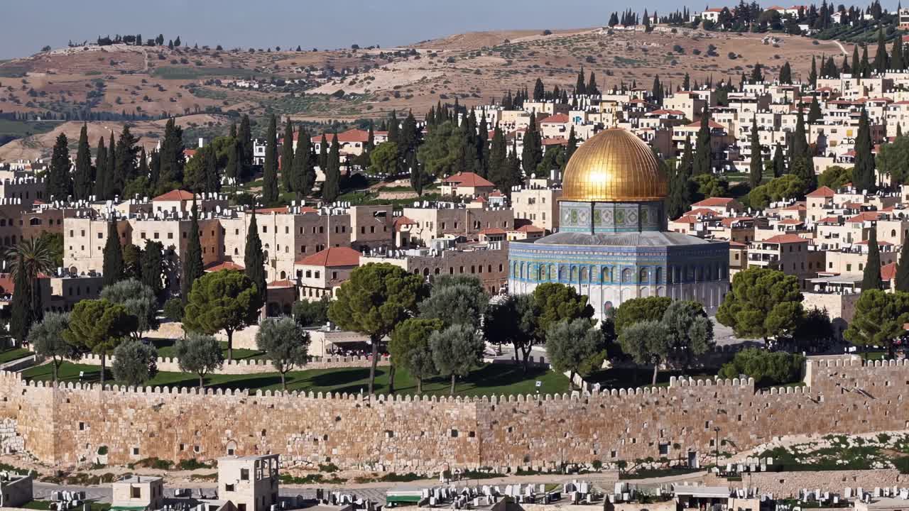 Aerial video captures the Dome of the Rock in Jerusalem, showcasing its golden dome and surrounding