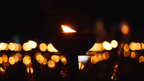 nighttime candlelight ceremony