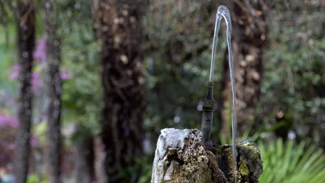 Water-splashes-from-a-small-fountain