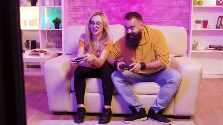 Boyfriend celebrates victory over his girlfriend in console play