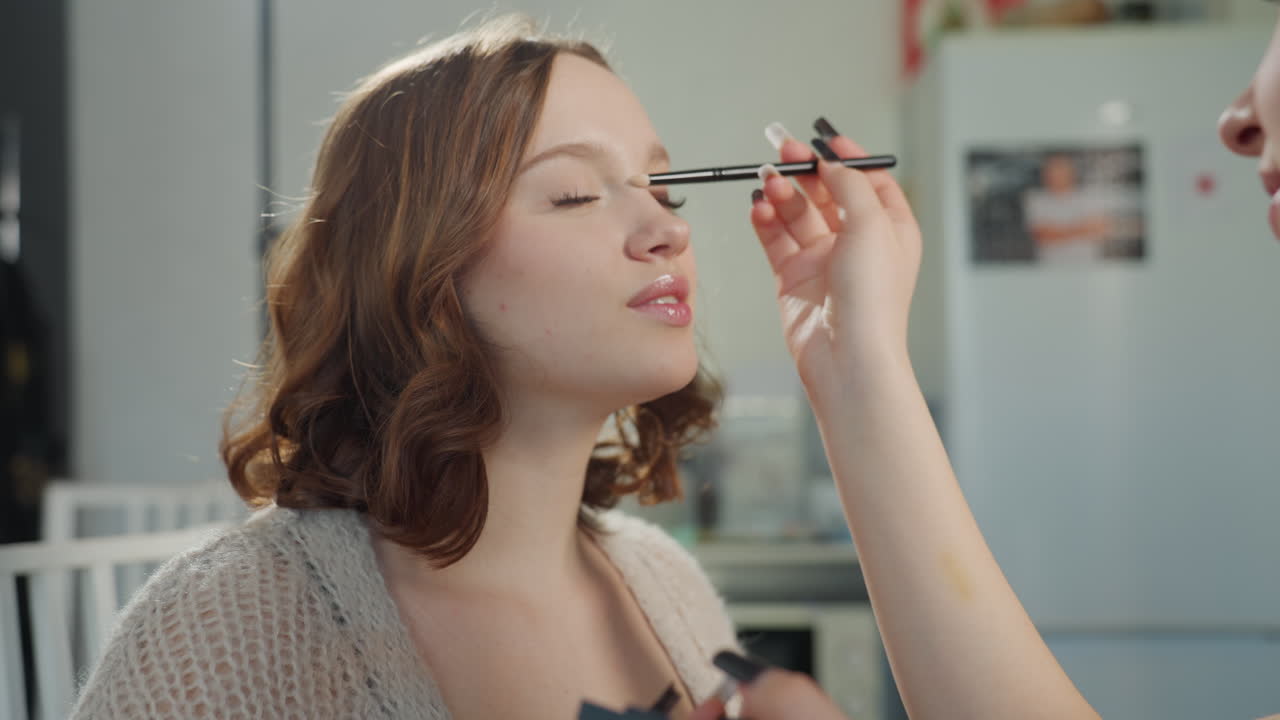 Female Person Receiving Professional Lipstick Application, Woman With Expertly Applied Lipstick In Studio Environment, Woman Confidently Having Makeup Artist Carefully Apply Lipstick In Studio